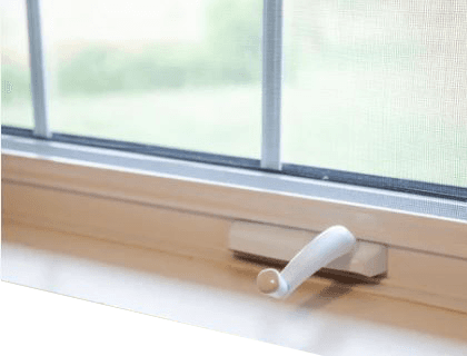 Technician repairing a casement window crank operator